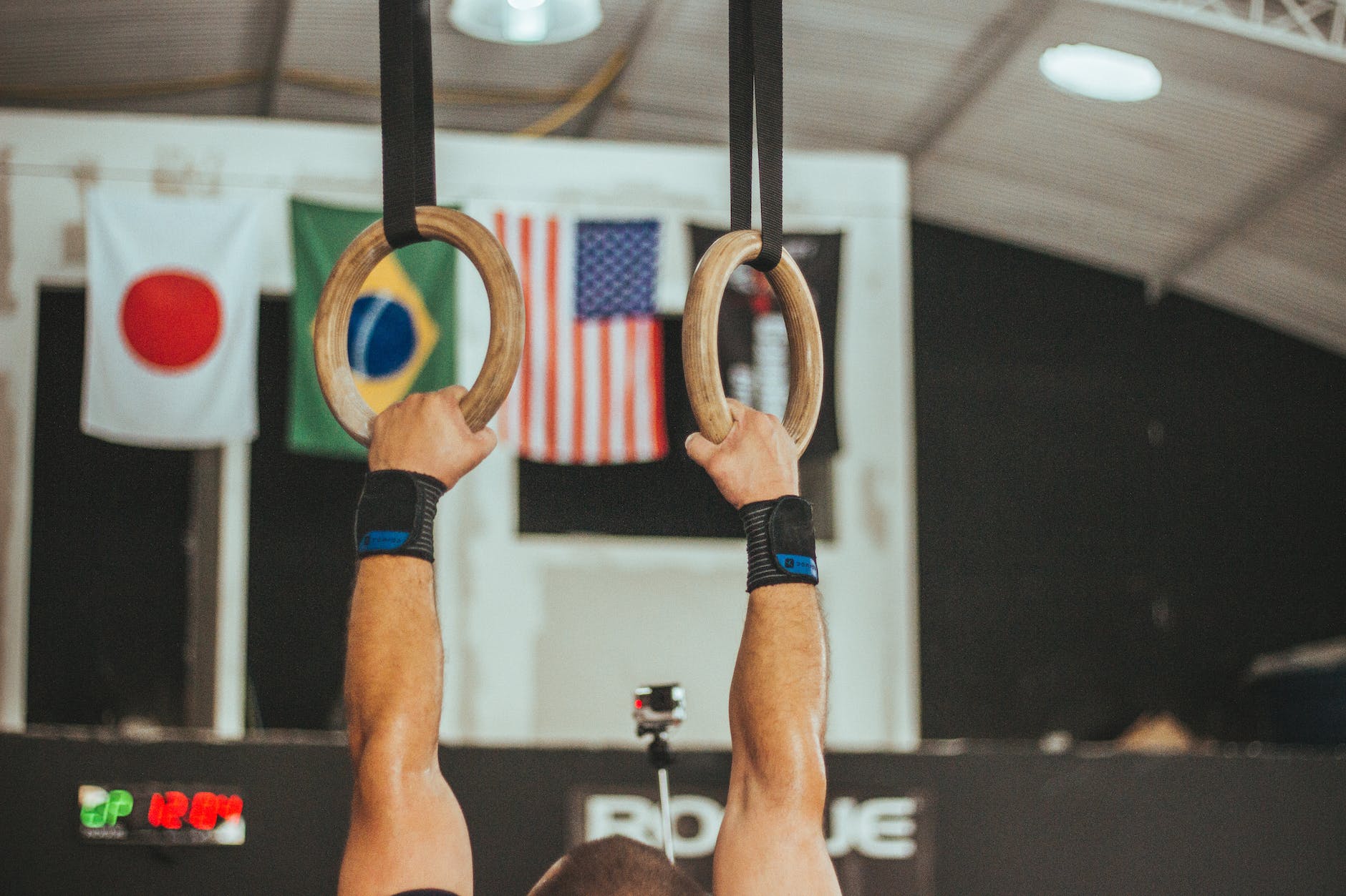 gymnast near assorted country flags
